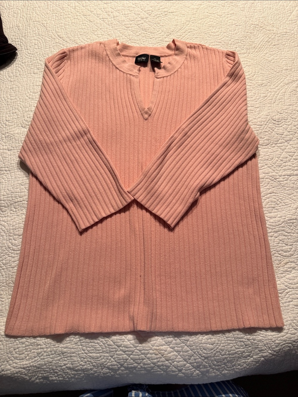 Pink Mossino ribbed sweater.